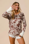 Shop Flower Printed Waffle Thumb Opening Top-Cozy and casual, flower printed waffle knit top features thumb openings, a classic crew neck, and a relaxed fit. Ideal for layering during transitional seasons.-Reef Love Boho-Chic Boutique