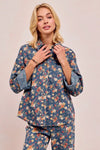 Shop Washed Floral Print Denim Shacket-This Washed Floral Print Denim Shacket features a relaxed oversized fit, button front, and vintage floral wash. Pair with wide leg jeans to complete the look.-Reef Love Boho-Chic Boutique