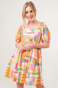 Square Neck Puff Sleeve Geo Printed Mini Dress-The square neck puff sleeve geo printed mini dress is a fashionable and eye-catching choice for a stylish ensemble. The square neckline adds a modern and chic touch-Reef Love Boho-Chic Boutique