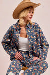 Shop Washed Floral Print Denim Shacket-This Washed Floral Print Denim Shacket features a relaxed oversized fit, button front, and vintage floral wash. Pair with wide leg jeans to complete the look.-Reef Love Boho-Chic Boutique