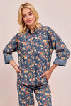 Shop Washed Floral Print Denim Shacket-This Washed Floral Print Denim Shacket features a relaxed oversized fit, button front, and vintage floral wash. Pair with wide leg jeans to complete the look.-Reef Love Boho-Chic Boutique