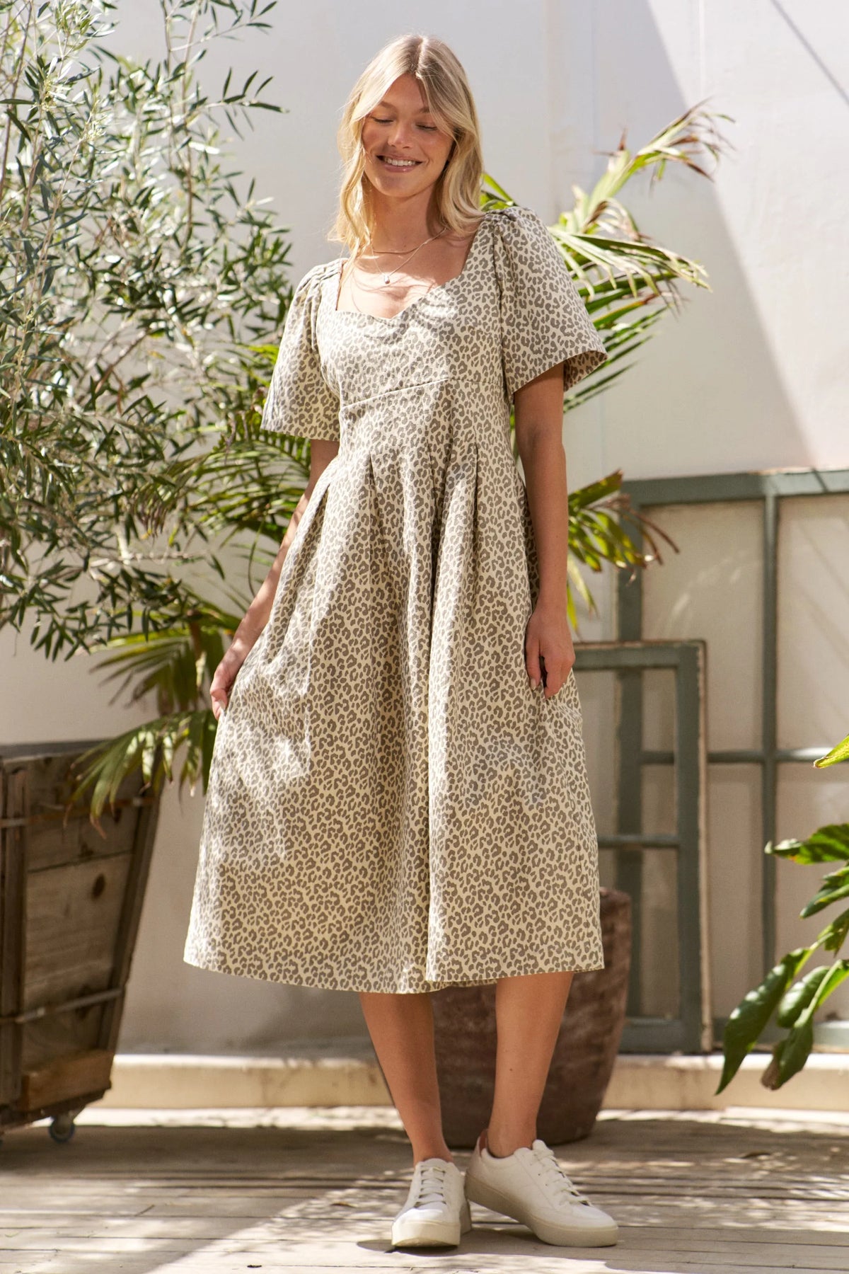 Leopard Print Bell Sleeve Midi Dress-Leopard Print Bell Sleeve Midi Dress, where vintage charm meets modern edge. Designed with a soft, breathable cotton blend, this lightweight dress is as comfortable -Reef Love Boho-Chic Boutique