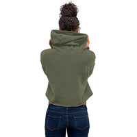 Person wearing a green hoodie from behind on a white background